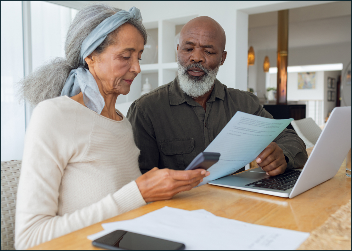 Elderly Couple Reviews a Legal Document