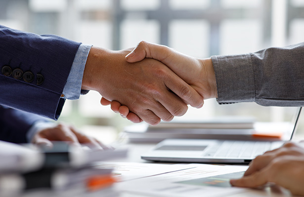 Financial Business handshake for teamwork of business merger and acquisition