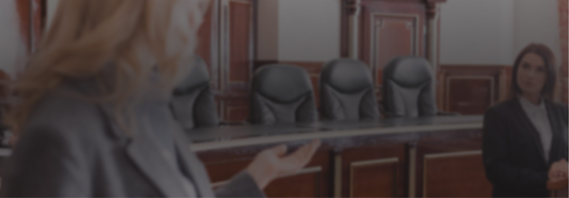 Out of Focus Photo of Attorneys in Court