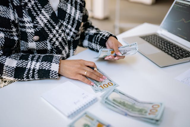 person counting money