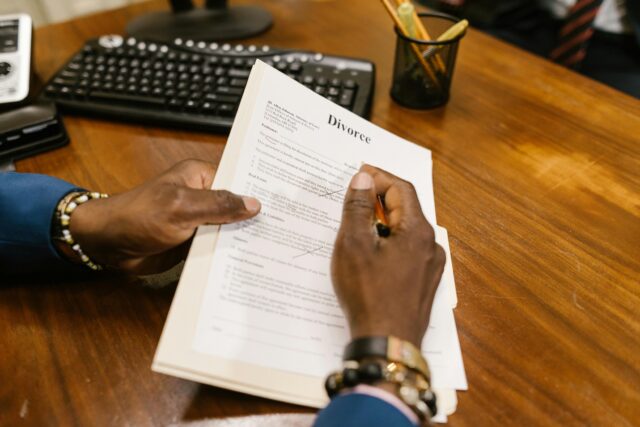 man holding divorce papers